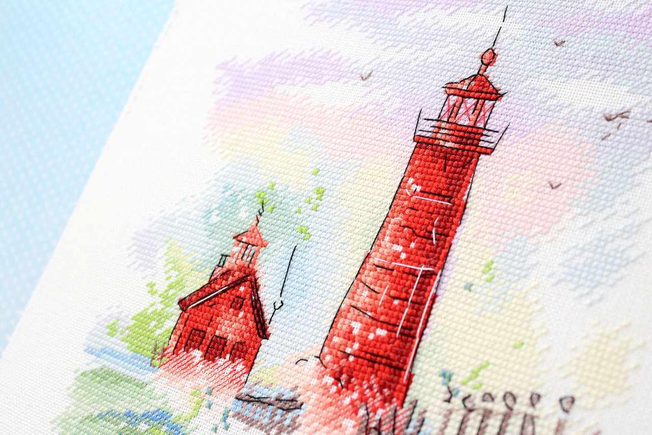 Sea Harbour SA-005 Cross-stitch kit featuring a vibrant marine landscape with a lighthouse, ocean, and violet sky.